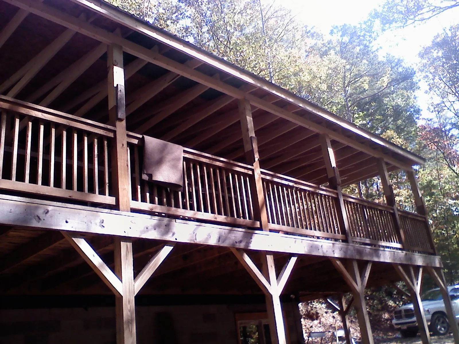 Timber framing under a new elevated porch and deck — Roof Leak Repair in Rock Springs by Roofing Brothers
